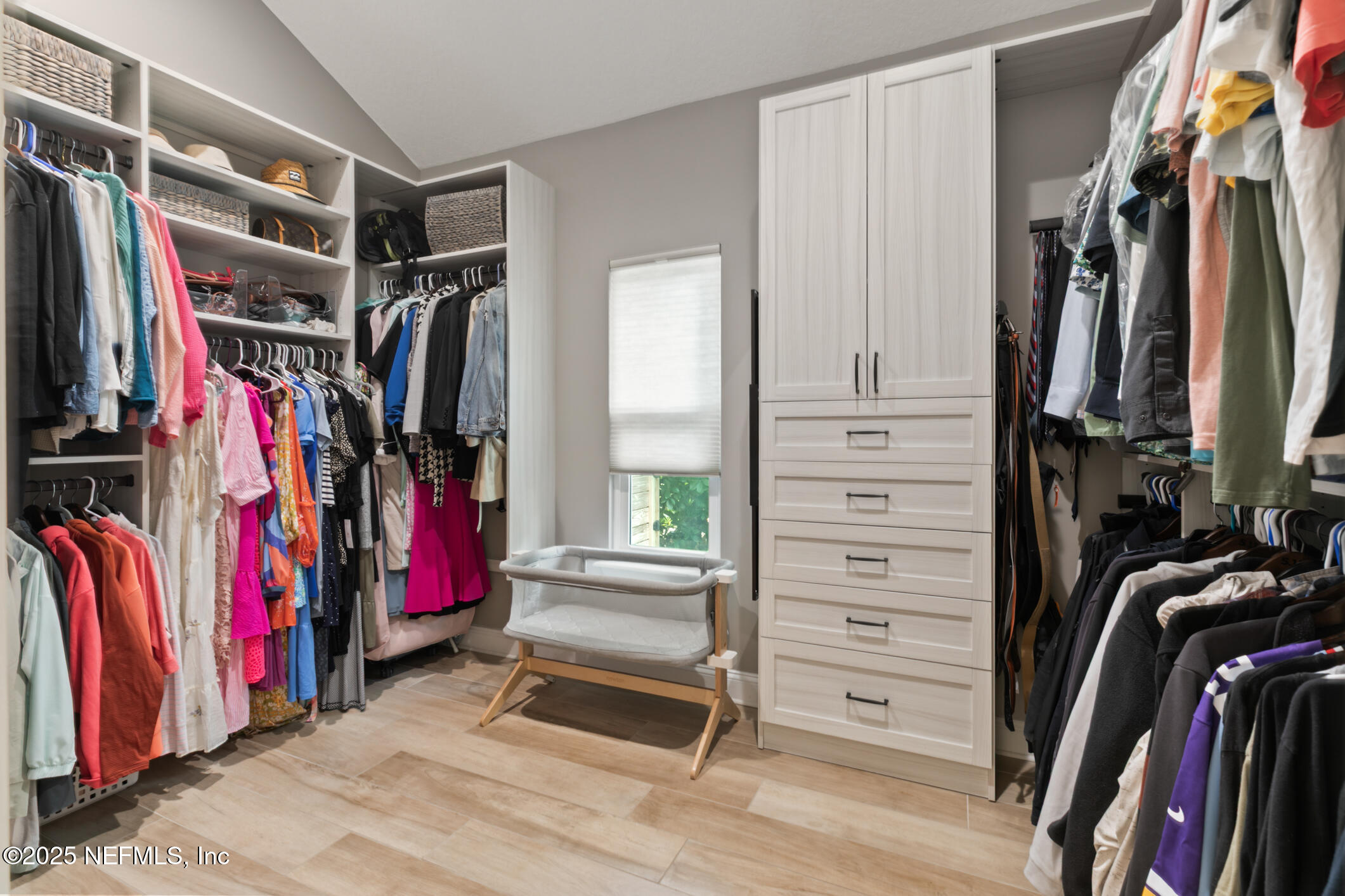 2341 Fiddlers Lane Atlantic Beach, FL 32233 - Photo 35 of 87 a view of walk in closet with clothes