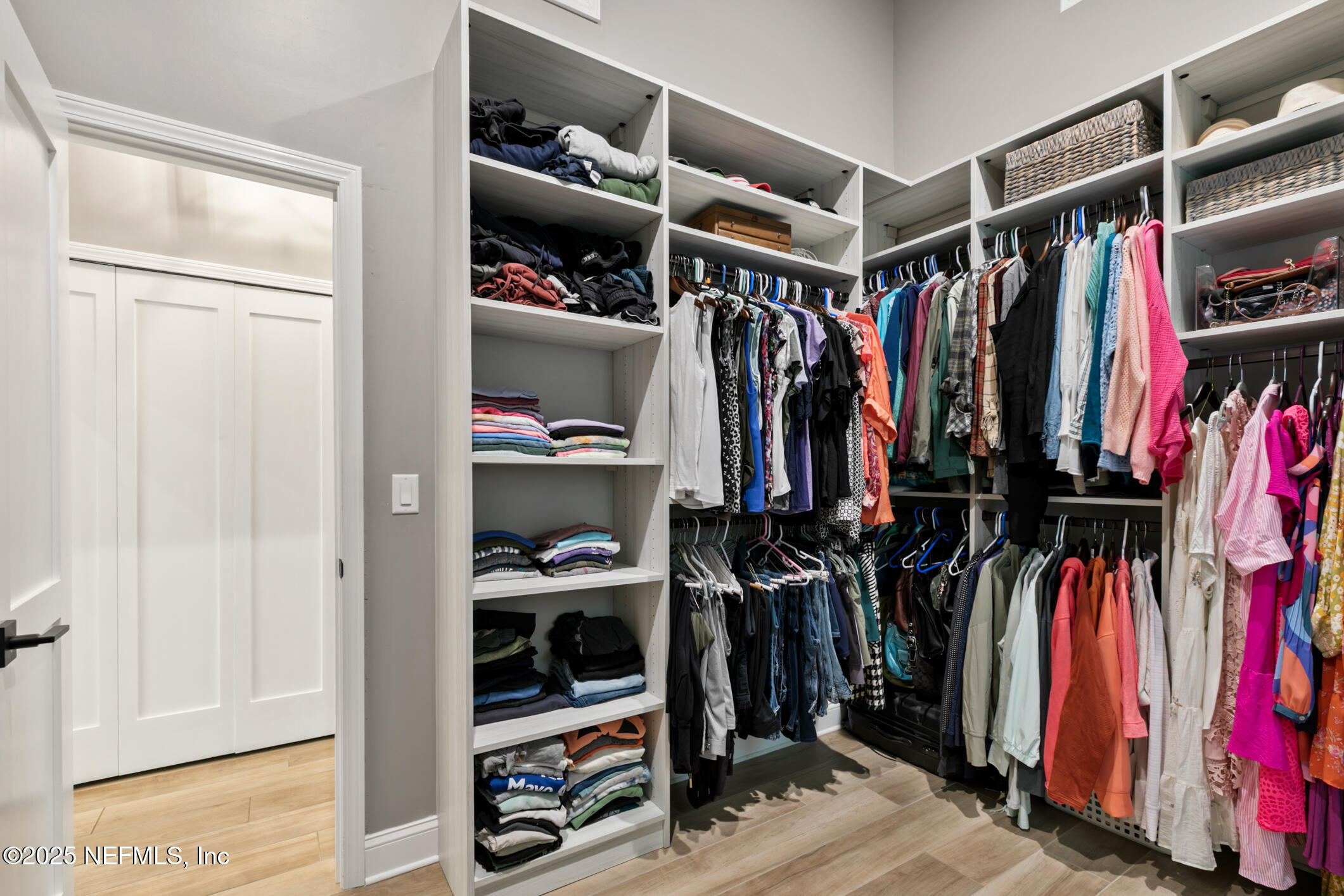 2341 Fiddlers Lane Atlantic Beach, FL 32233 - Photo 36 of 87 a view of walk in closet with clothes and shoes