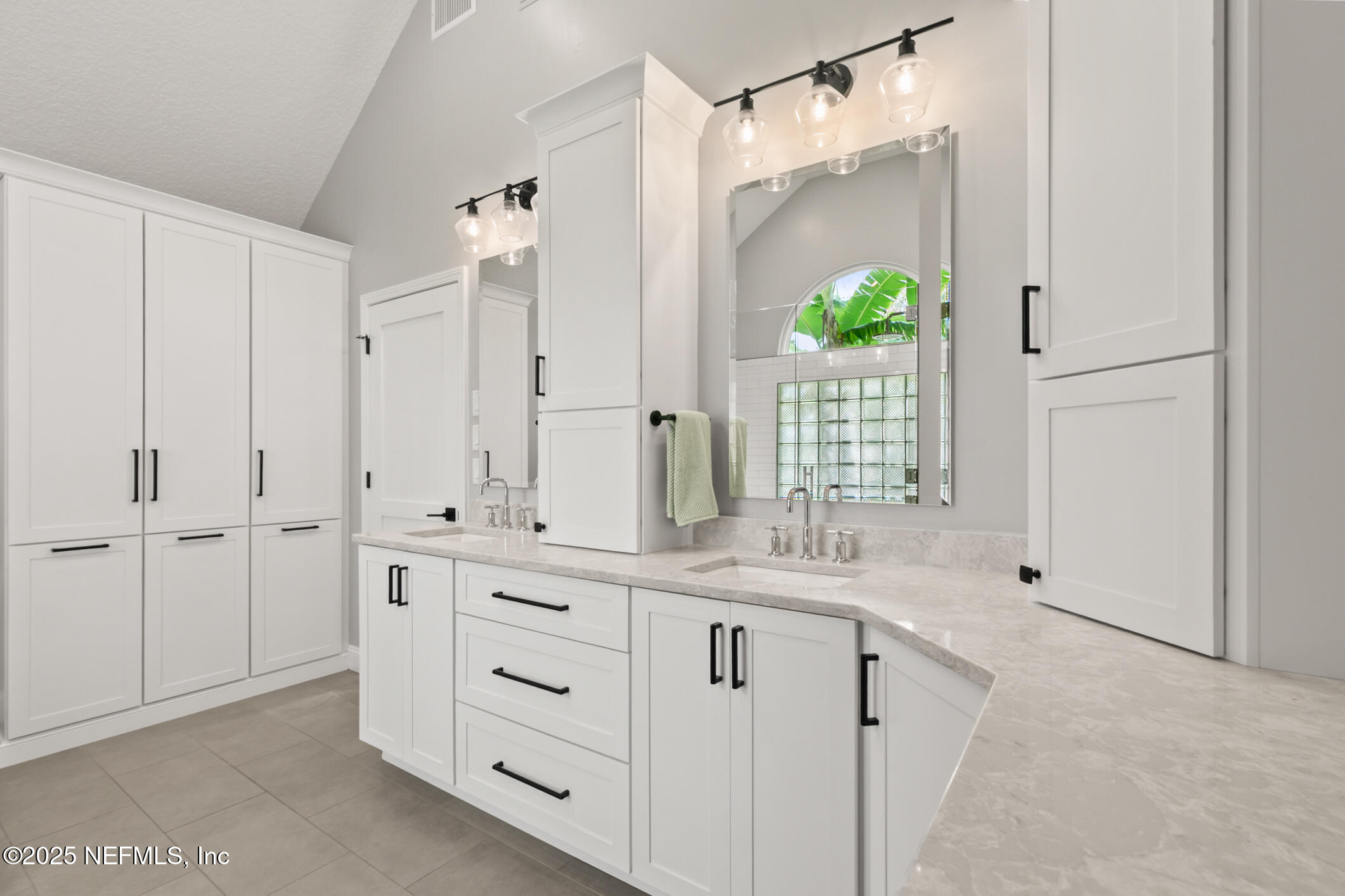 2341 Fiddlers Lane Atlantic Beach, FL 32233 - Photo 40 of 87 a bathroom with a double vanity sink and a mirror