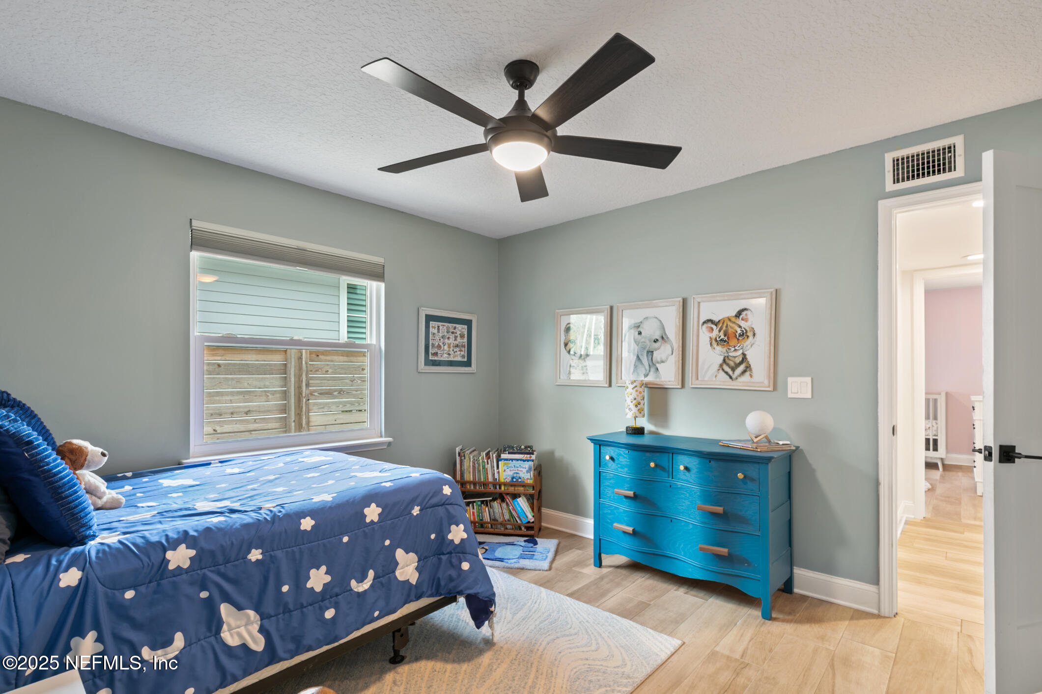 2341 Fiddlers Lane Atlantic Beach, FL 32233 - Photo 46 of 87 a bedroom with a bed and a window