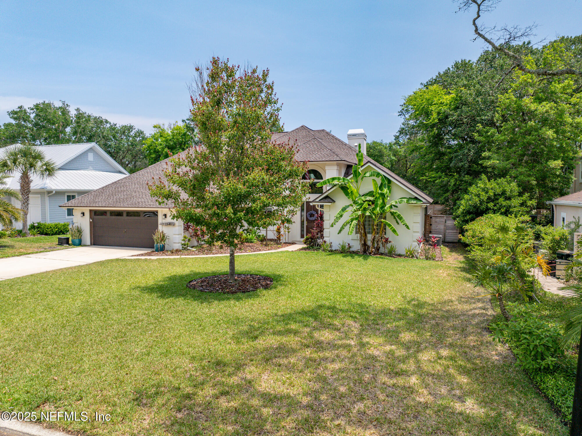 2341 Fiddlers Lane Atlantic Beach, FL 32233 - Photo 5 of 87 a backyard of a house with lots of green space