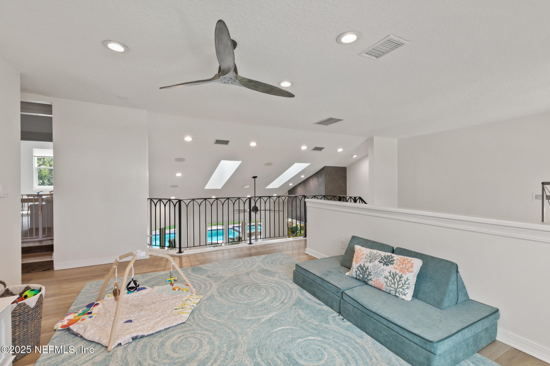 2341 Fiddlers Lane Atlantic Beach, FL 32233 - Photo 53 of 87 a living room with furniture and a ceiling fan