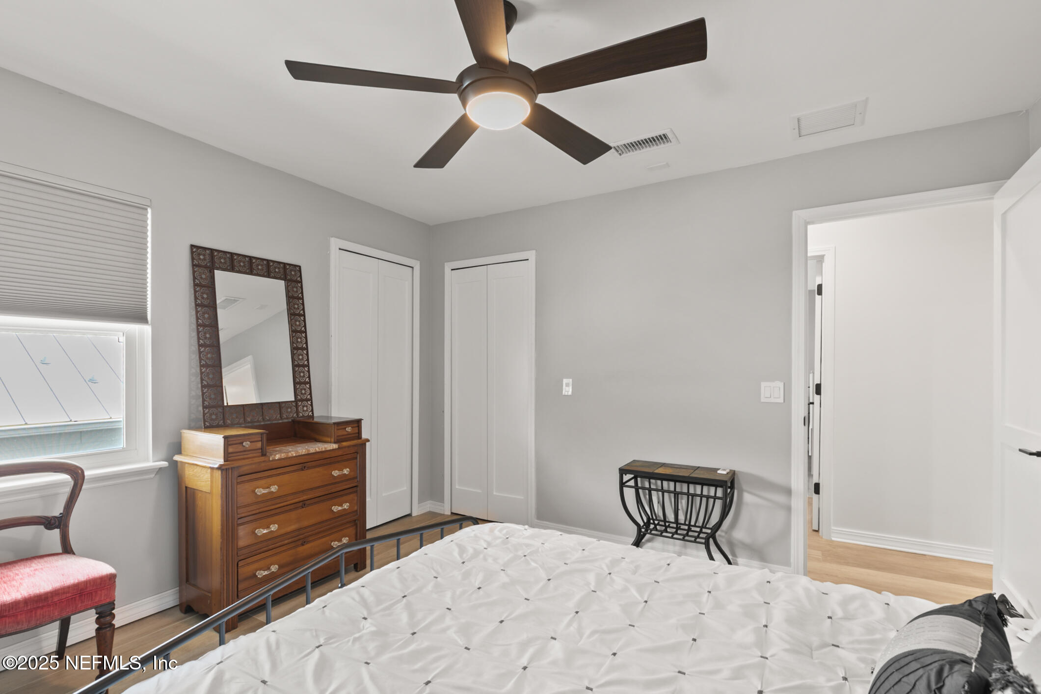 2341 Fiddlers Lane Atlantic Beach, FL 32233 - Photo 57 of 87 a bedroom with a bed dresser and a chair