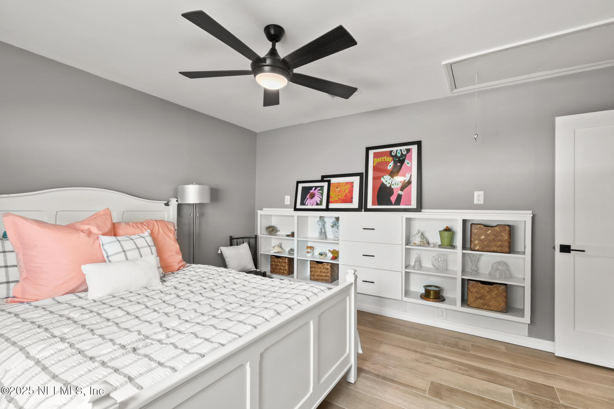 2341 Fiddlers Lane Atlantic Beach, FL 32233 - Photo 59 of 87 a bedroom with a large bed and a chandelier