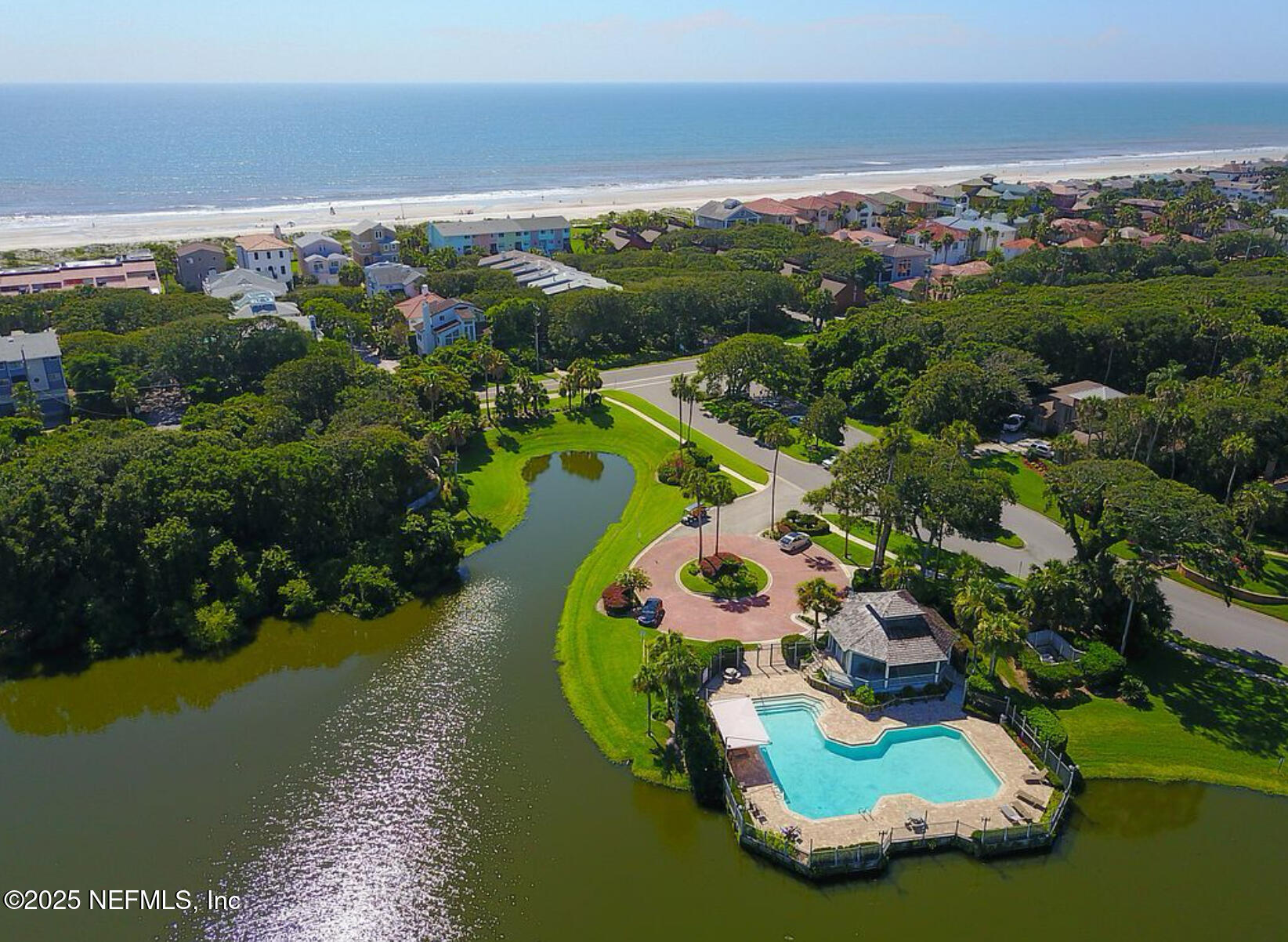 2341 Fiddlers Lane Atlantic Beach, FL 32233 - Photo 83 of 87 an aerial view of a house with a lake view