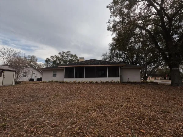 a house with trees in front of it