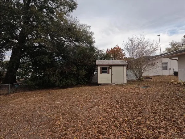 a house with trees in front of it