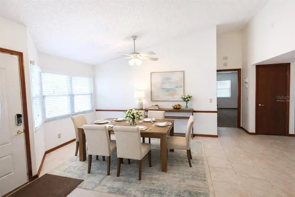 a view of a dining room with furniture