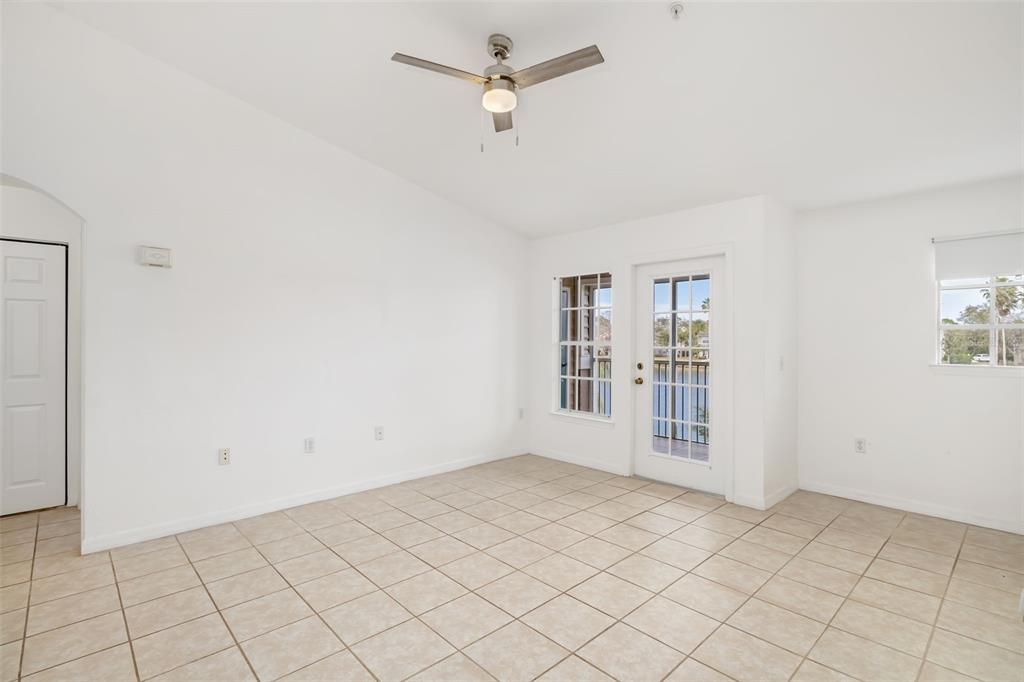 8933 Manor Loop, Unit 205 Lakewood Ranch, FL 34202 - Photo 11 of 76 a view of an empty room with a window