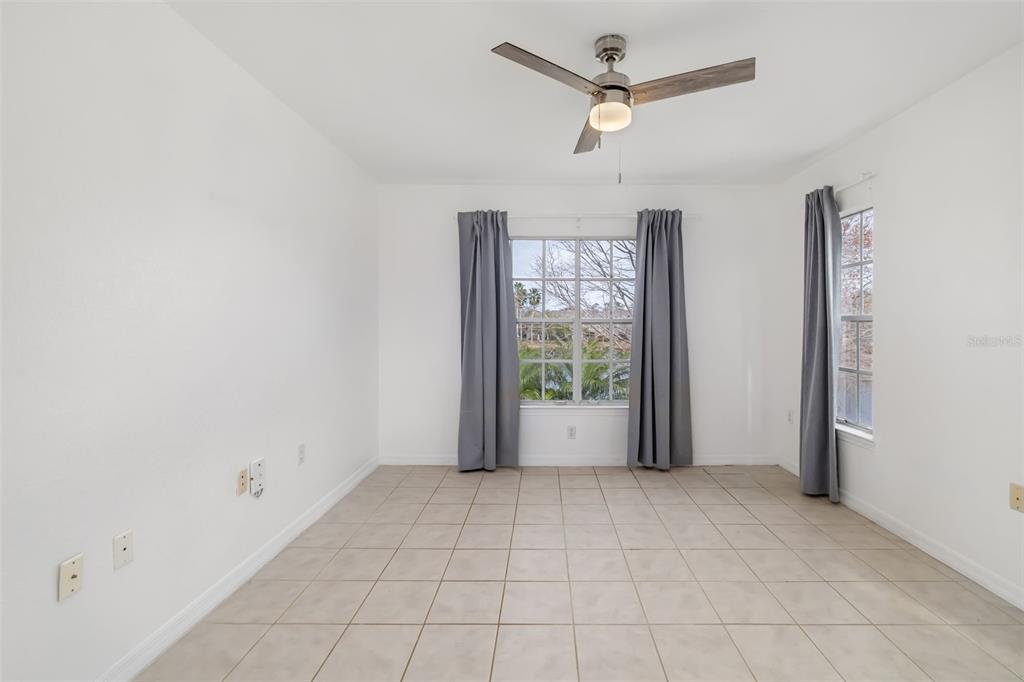 8933 Manor Loop, Unit 205 Lakewood Ranch, FL 34202 - Photo 20 of 76 a view of an empty room with a window