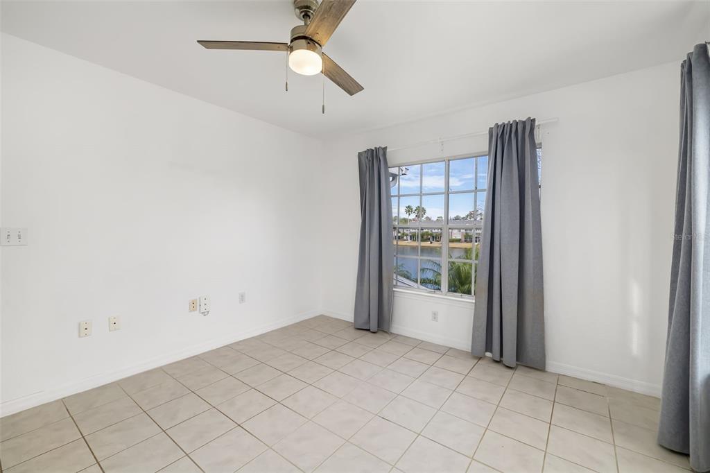 8933 Manor Loop, Unit 205 Lakewood Ranch, FL 34202 - Photo 21 of 76 an empty room with windows