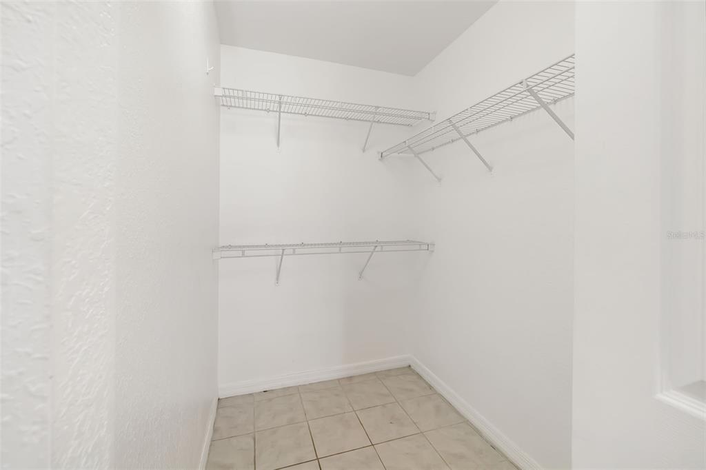 8933 Manor Loop, Unit 205 Lakewood Ranch, FL 34202 - Photo 29 of 76 a view of a room with racks on the wall