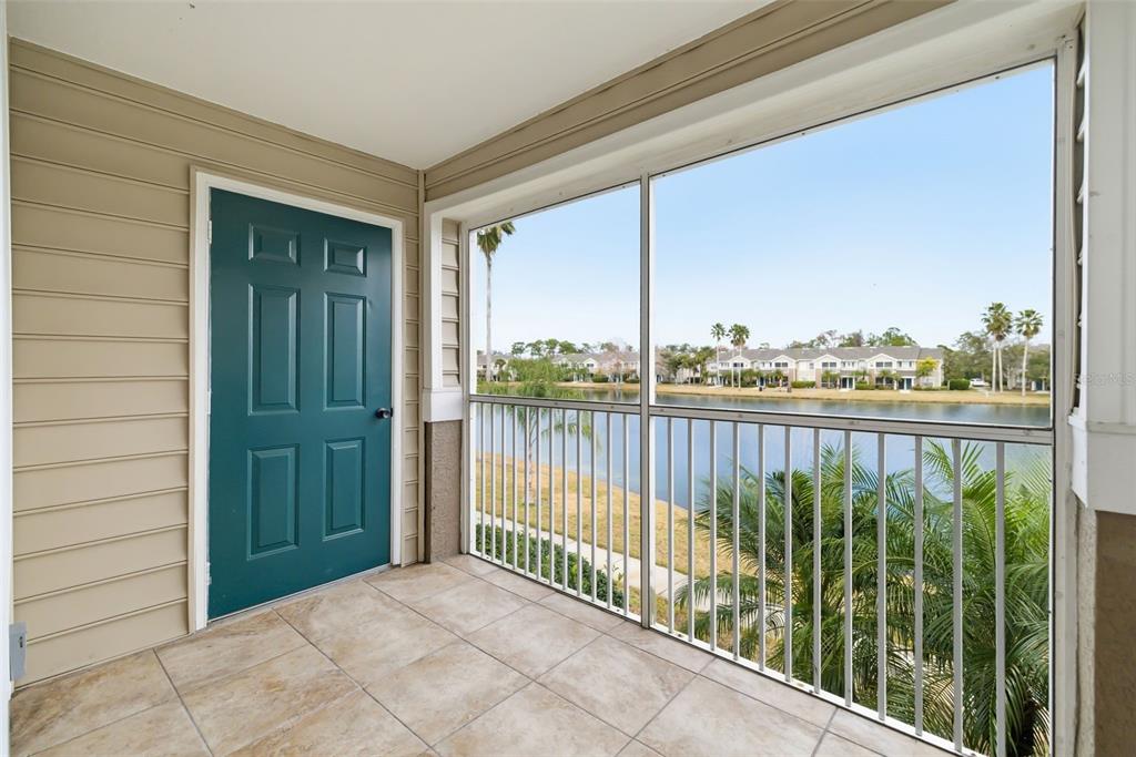 8933 Manor Loop, Unit 205 Lakewood Ranch, FL 34202 - Photo 33 of 76 a balcony with lake view