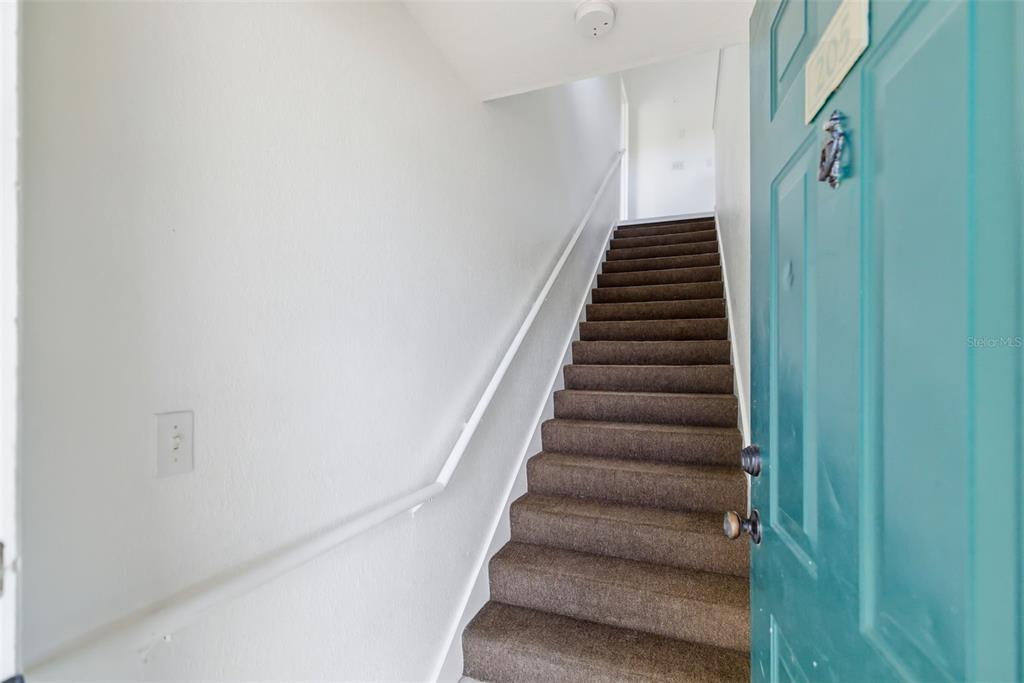 8933 Manor Loop, Unit 205 Lakewood Ranch, FL 34202 - Photo 4 of 76 a view of entryway with stairs