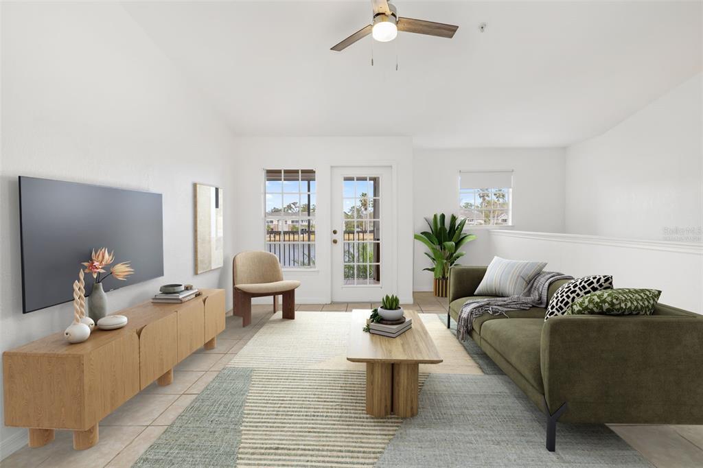 8933 Manor Loop, Unit 205 Lakewood Ranch, FL 34202 - Photo 8 of 76 a living room with furniture