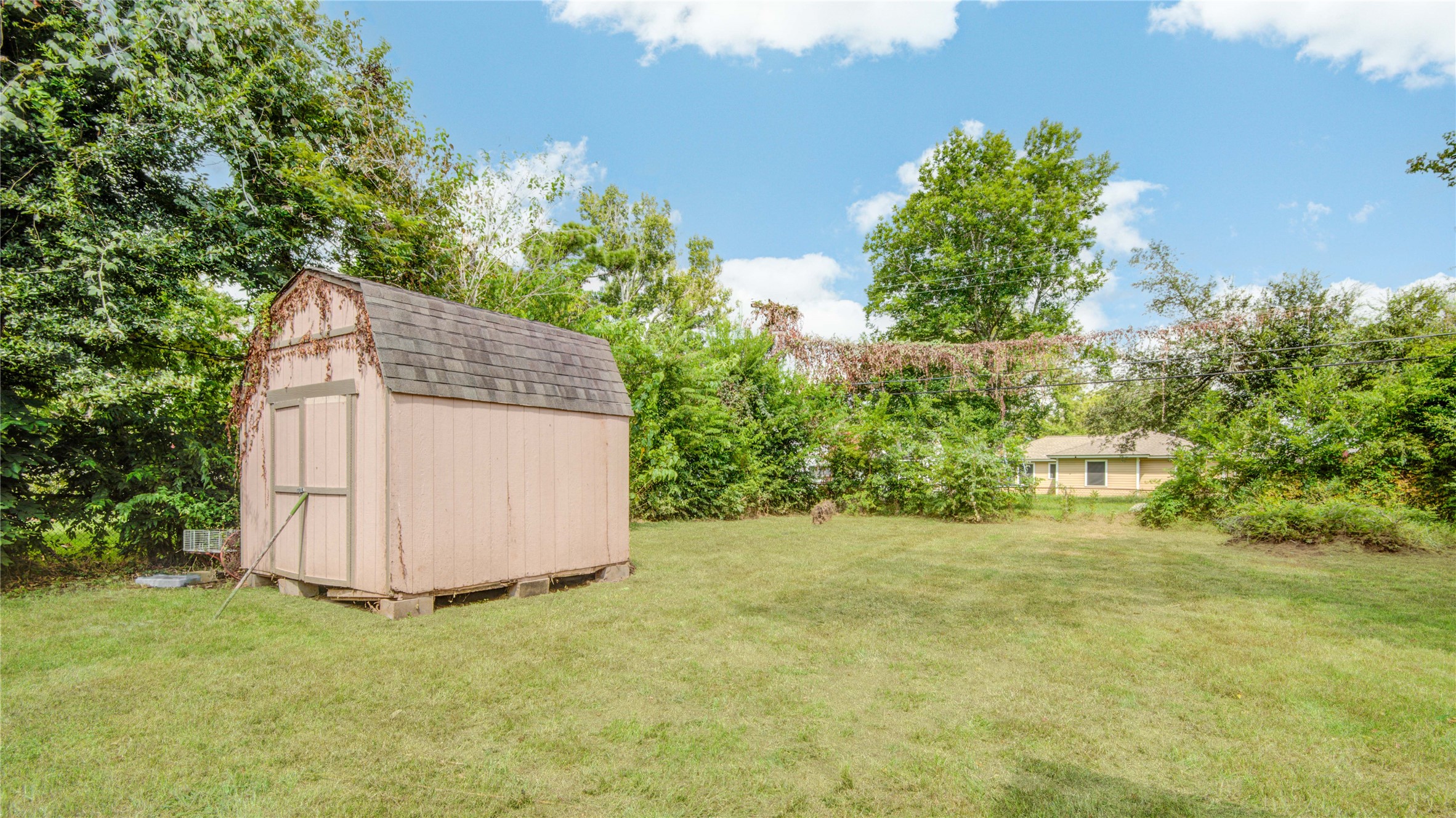 513 Farrer Street Angleton, TX 77515 - Photo 29 of 32 a view of a backyard