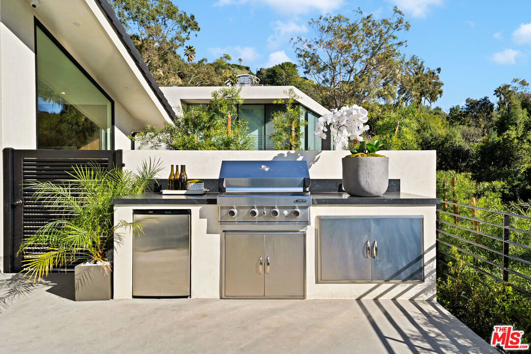 2181 Outpost Drive Los Angeles, CA 90068 - Photo 41 of 51 a view of a kitchen with a sink and wooden floor