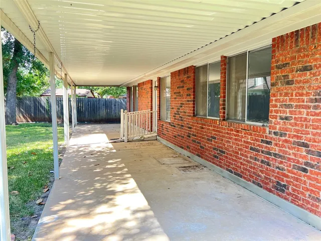 a view of a backyard with a garden