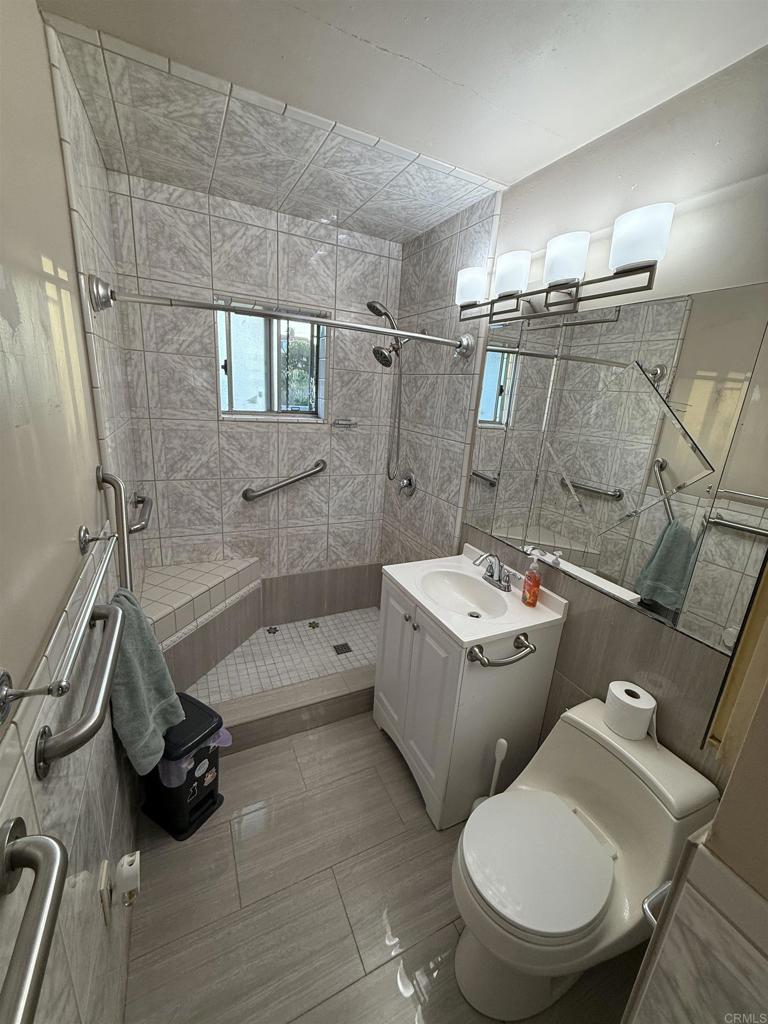 2220 Rachael Avenue National City, CA 91950 - Photo 11 of 26 a bathroom with a sink toilet and shower