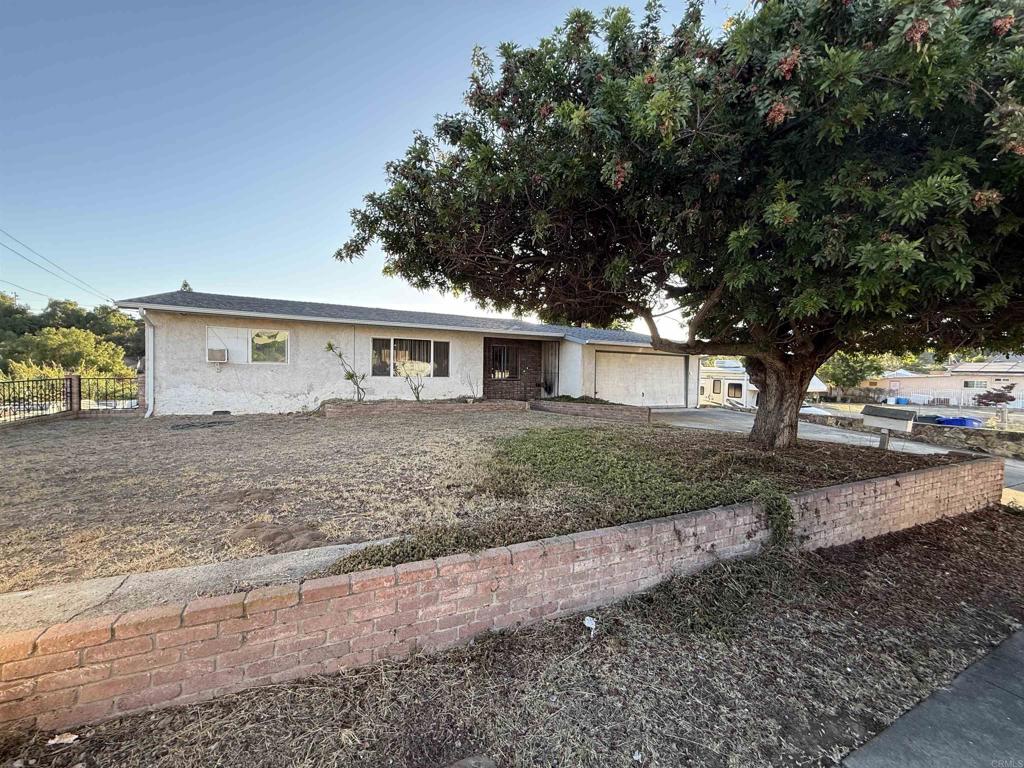 2220 Rachael Avenue National City, CA 91950 - Photo 2 of 26 a view of house with a yard