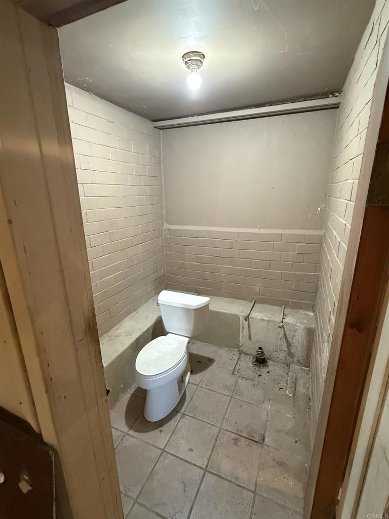 2220 Rachael Avenue National City, CA 91950 - Photo 26 of 26 a bathroom with a toilet and a shower