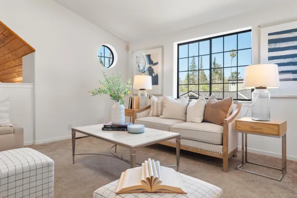 a workspace with furniture and window