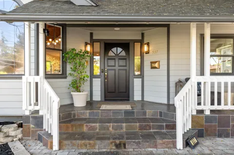 a front view of a house with a porch
