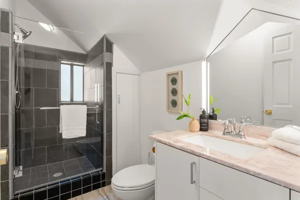 a view of a couches in the balcony