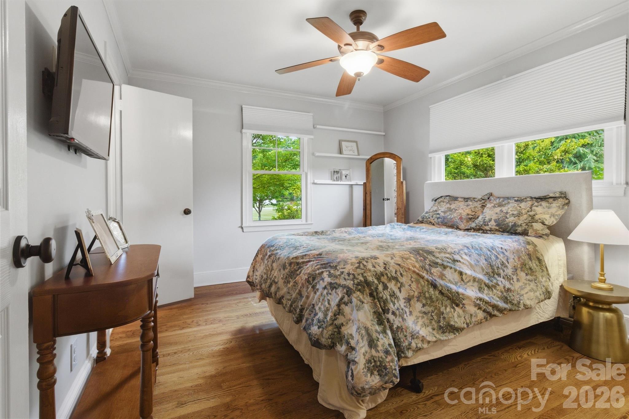 4712 Secrest Short Cut Road Monroe, NC 28110 - Photo 16 of 30 a bedroom with a bed mirror and window