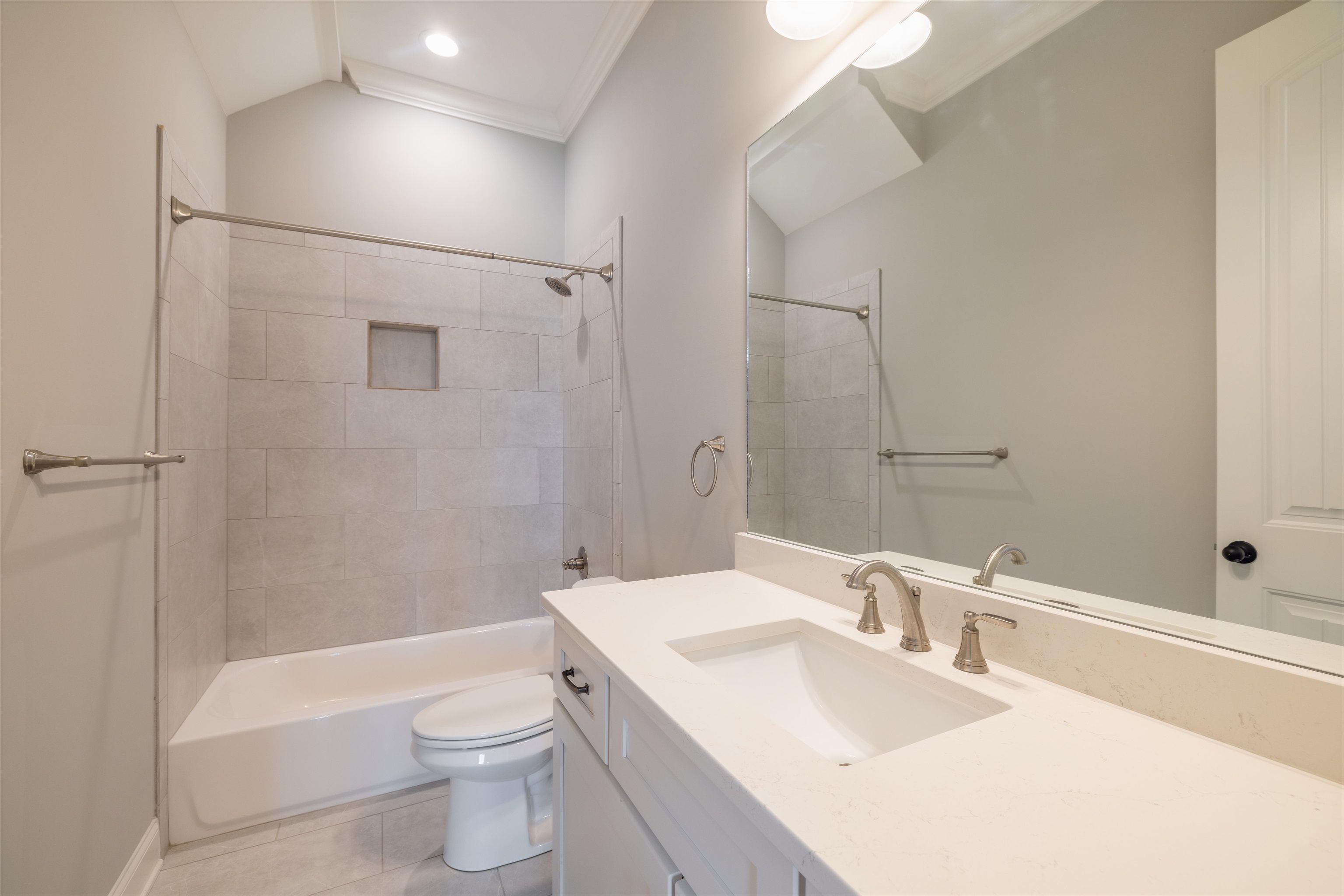 1272 Percheron Pass Collierville, TN 38017 - Photo 20 of 24 a bathroom with a bathtub shower sink vanity mirror and toilet