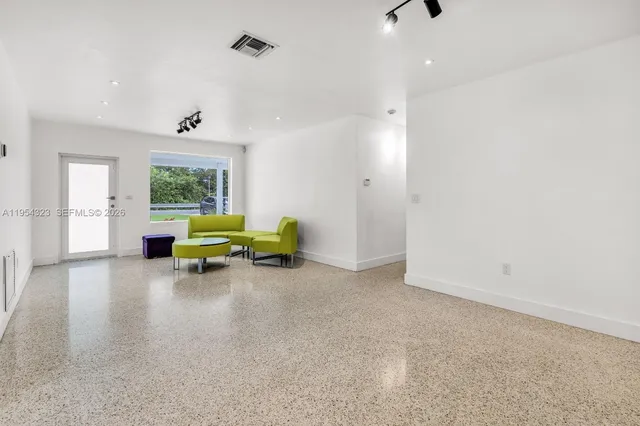 $1,050,000 | 1040 North Royal Poinciana Boulevard, Miami Springs, FL 33166