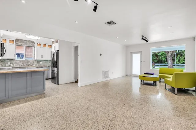 $1,050,000 | 1040 North Royal Poinciana Boulevard, Miami Springs, FL 33166