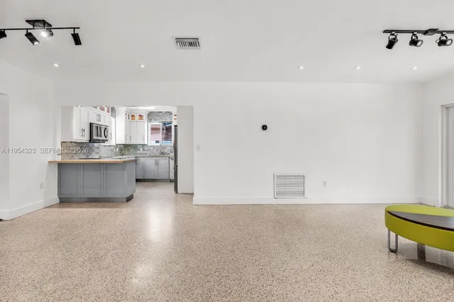 $1,050,000 | 1040 North Royal Poinciana Boulevard, Miami Springs, FL 33166