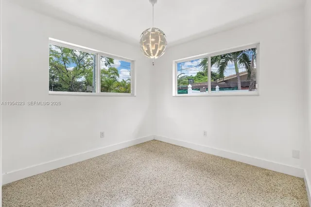 $1,050,000 | 1040 North Royal Poinciana Boulevard, Miami Springs, FL 33166