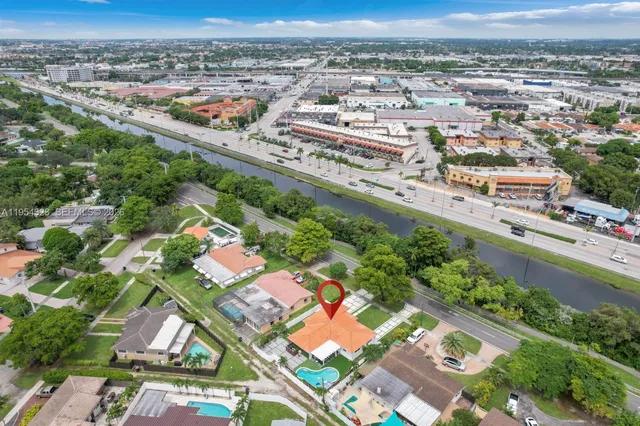 $1,050,000 | 1040 North Royal Poinciana Boulevard, Miami Springs, FL 33166