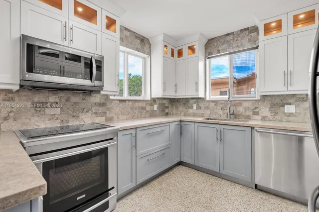 $1,050,000 | 1040 North Royal Poinciana Boulevard, Miami Springs, FL 33166