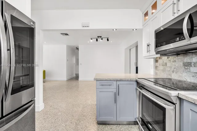 $1,050,000 | 1040 North Royal Poinciana Boulevard, Miami Springs, FL 33166