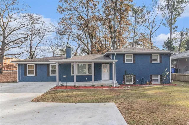 a front view of house with yard