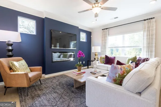 a living room with furniture and a window
