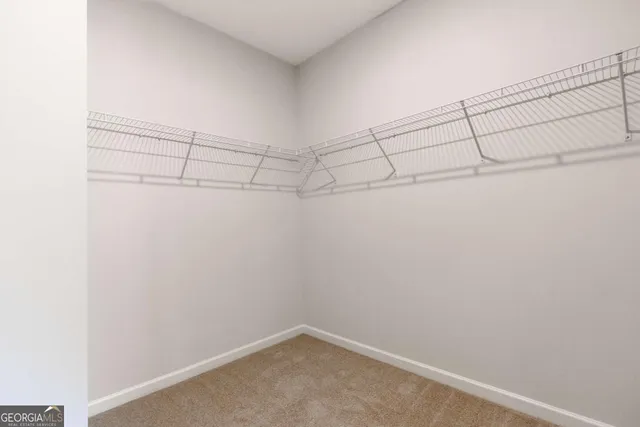 a view of a room with racks on the wall