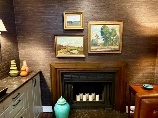 a fireplace with a wooden floor