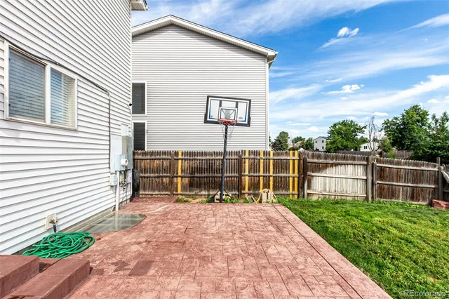 a childrens park with lots of swings and slides