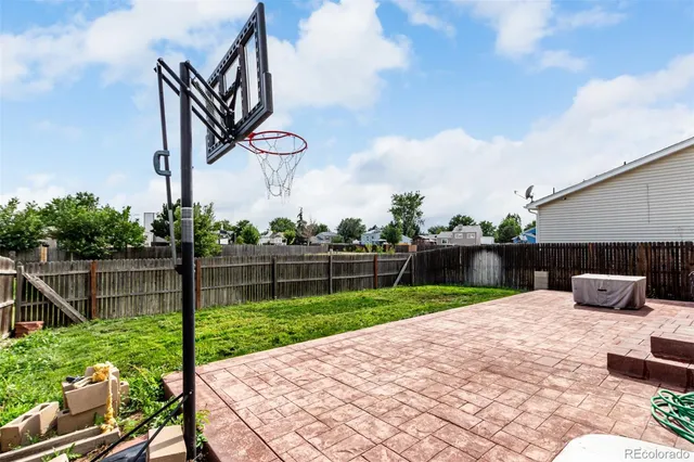 a front view of a house with a yard and porch