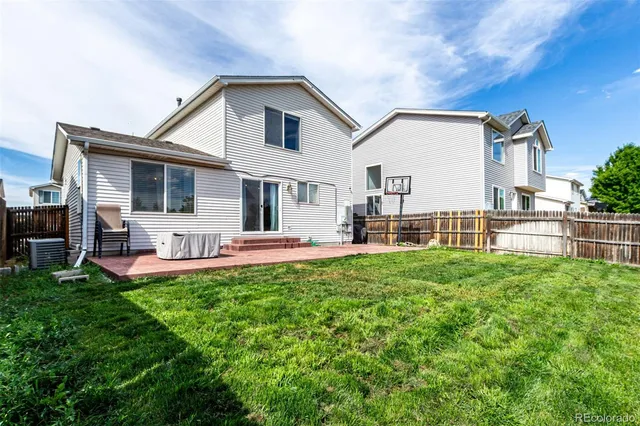 a front view of house with yard and seating area