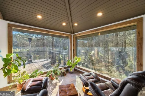 a spacious bathroom with a granite countertop sink a toilet and shower