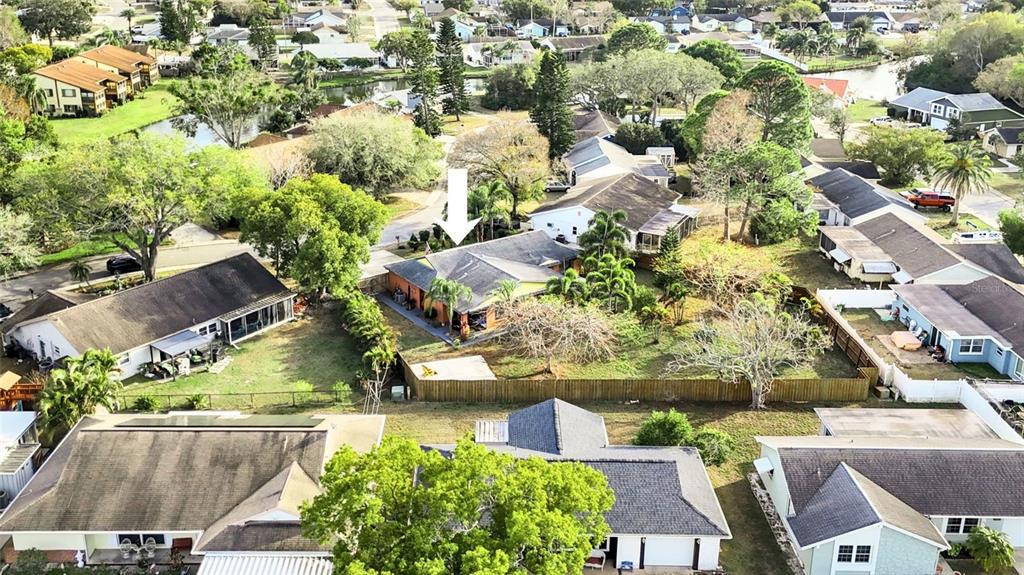 3849 Edgemont Drive New Port Richey, FL 34652 - Photo 11 of 43 an aerial view of residential houses with outdoor space