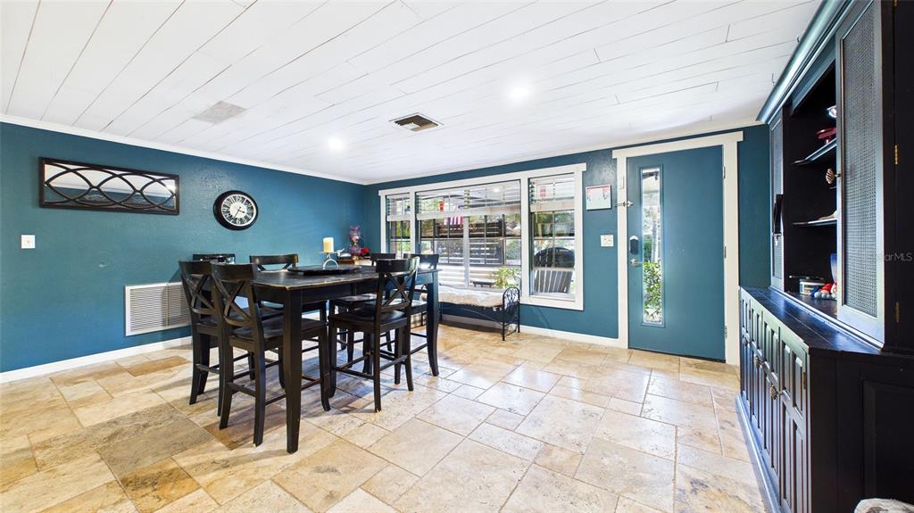 3849 Edgemont Drive New Port Richey, FL 34652 - Photo 17 of 43 a view of a dining room with furniture