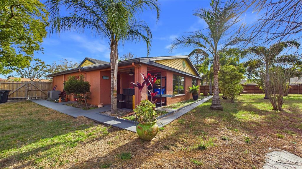 3849 Edgemont Drive New Port Richey, FL 34652 - Photo 38 of 43 a view of a house with backyard