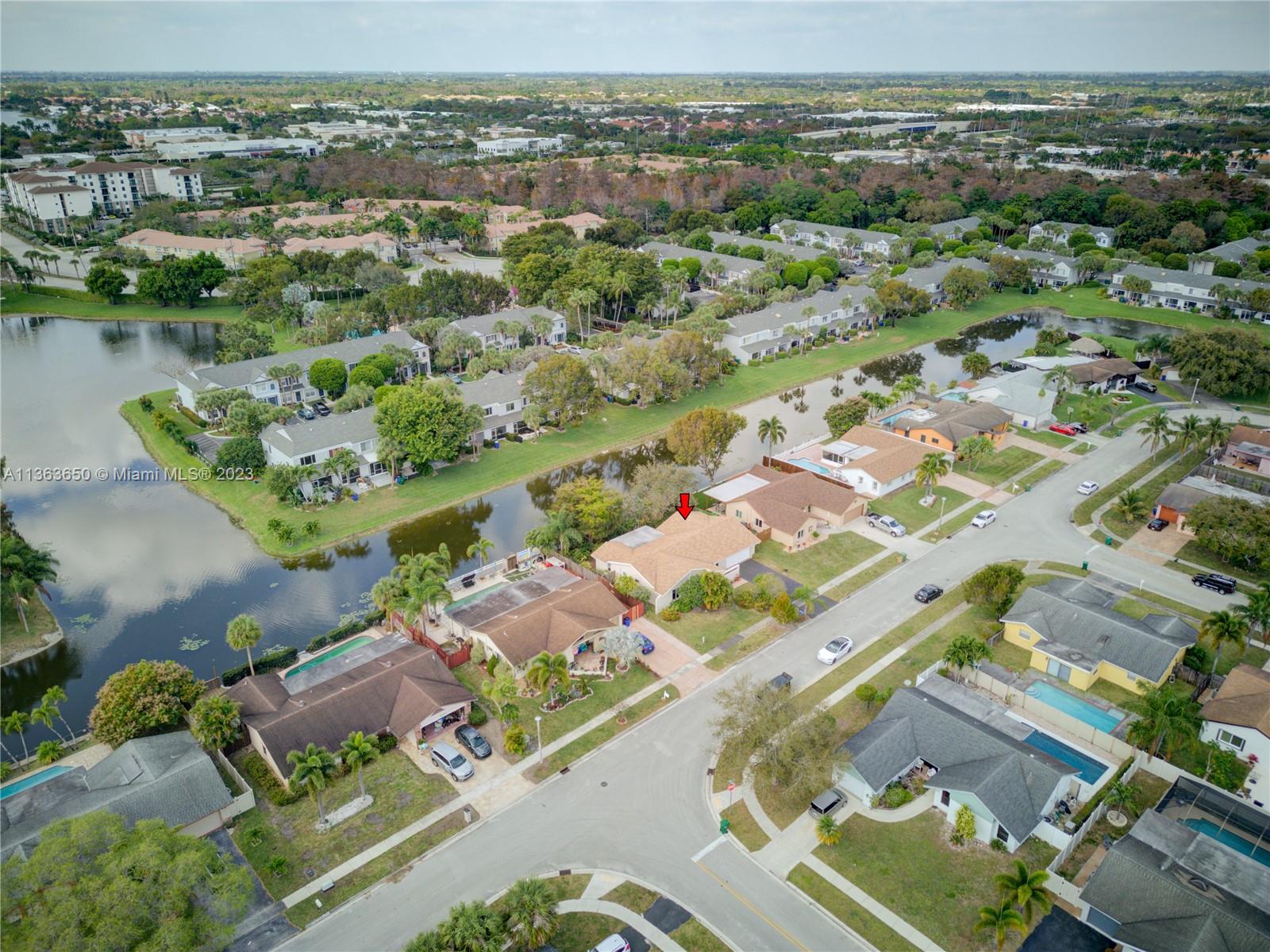 Coral Gate Margate, FL 33063 - Photo 11 of 16 an aerial view of residential houses with outdoor space