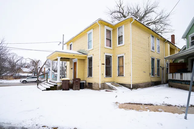 a view of a parked white house